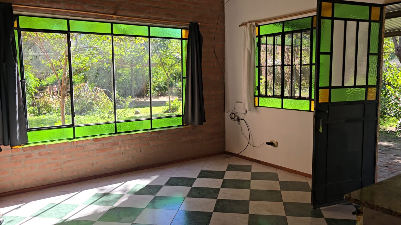 Galería con acceso al jardín